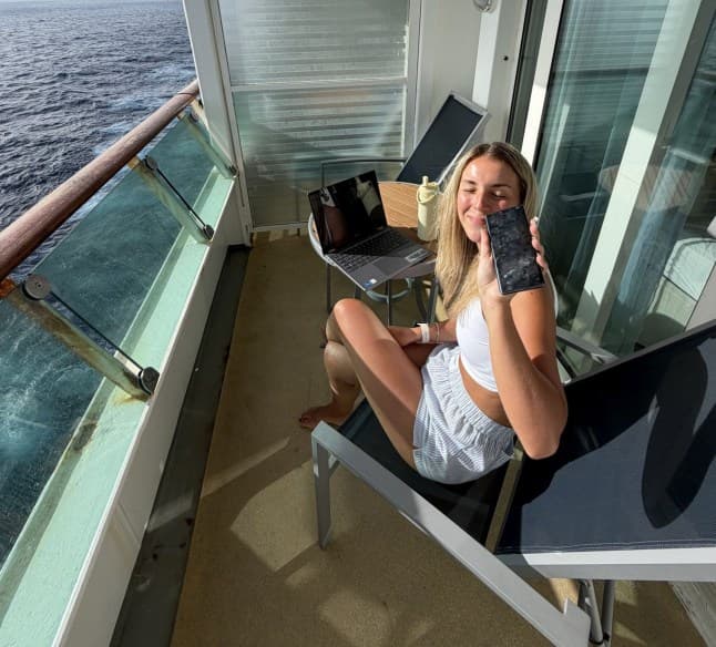 Katrina Middleton working remotely on a cruise ship